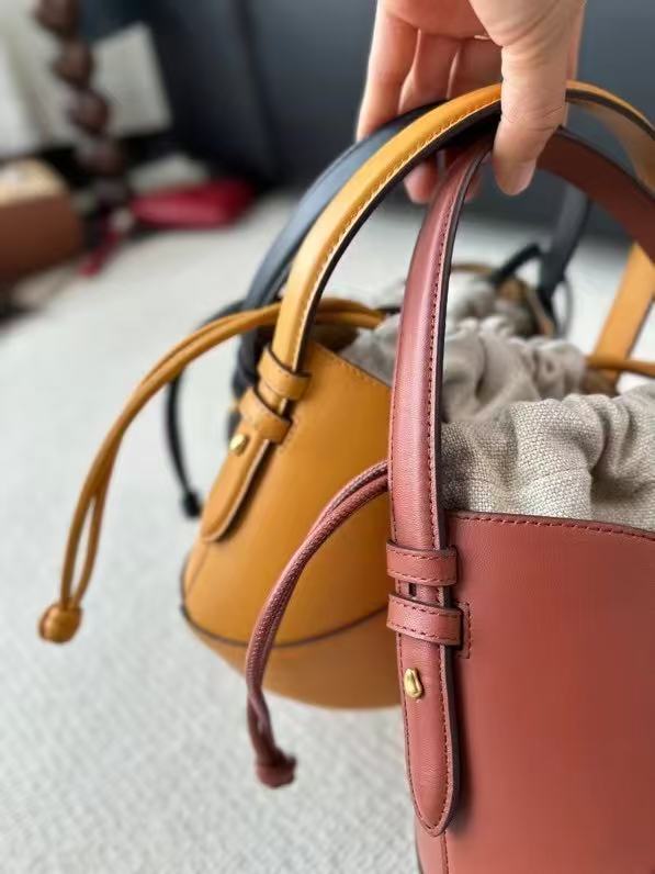 2025 New Black Niche Retro Cowhide Lucky Bag Vegetable Basket Bucket Bag Women's Minimalist Drawstring Canvas Inner Pocket Wrist Handbag