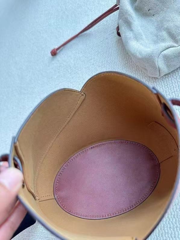 2025 New Black Niche Retro Cowhide Lucky Bag Vegetable Basket Bucket Bag Women's Minimalist Drawstring Canvas Inner Pocket Wrist Handbag