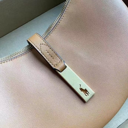 Niche Light Brown Metal Logo Lock Saddle One-shoulder Underarm Commuter Bag Women's Leather Handbag Crescent Cowhide Bag