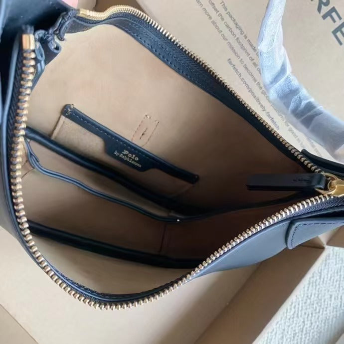 Niche Light Brown Metal Logo Lock Saddle One-shoulder Underarm Commuter Bag Women's Leather Handbag Crescent Cowhide Bag