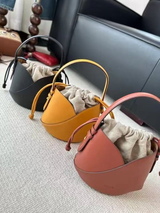 2025 New Black Niche Retro Cowhide Lucky Bag Vegetable Basket Bucket Bag Women's Minimalist Drawstring Canvas Inner Pocket Wrist Handbag