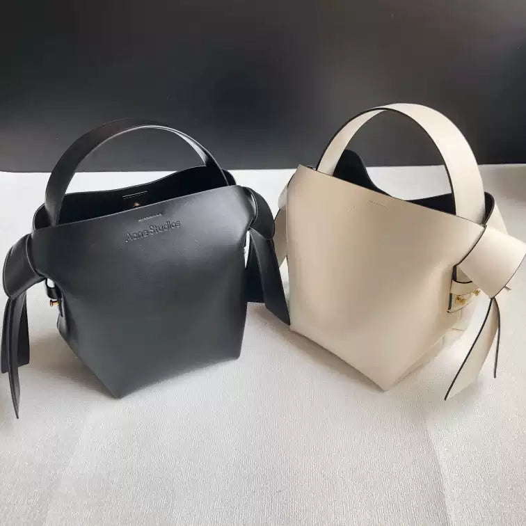 Niche Gray Musubi Bow Mimi Cowhide Bucket Bag Women‘s Minimalist Style Hand-held Commuter Bag