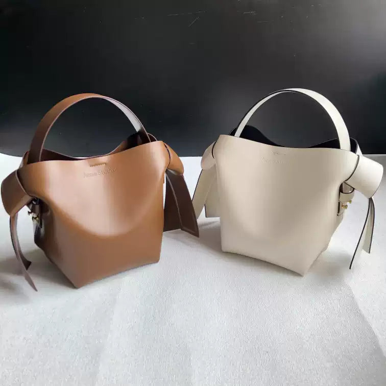 Niche Gray Musubi Bow Mimi Cowhide Bucket Bag Women‘s Minimalist Style Hand-held Commuter Bag
