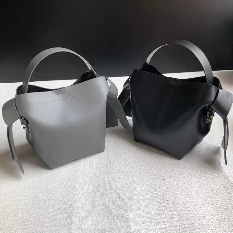 Niche Gray Musubi Bow Mimi Cowhide Bucket Bag Women‘s Minimalist Style Hand-held Commuter Bag