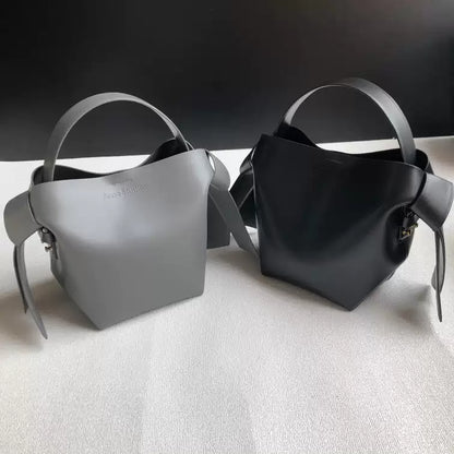 Niche Gray Musubi Bow Mimi Cowhide Bucket Bag Women‘s Minimalist Style Hand-held Commuter Bag